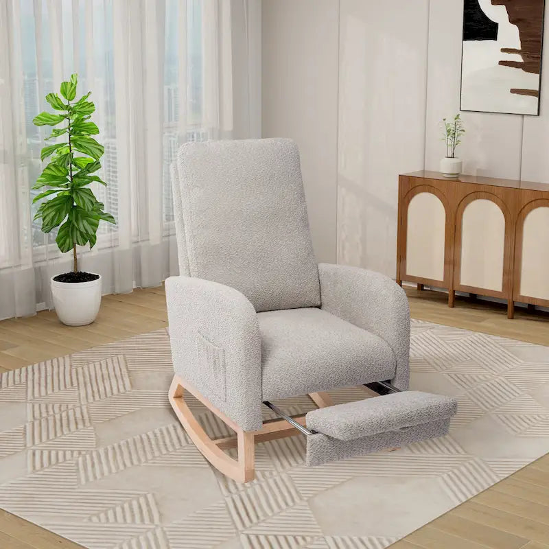 Fauteuil à bascule à dossier haut avec repose-pieds rétractable