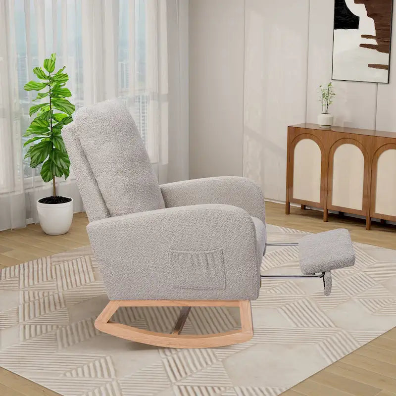 Fauteuil à bascule à dossier haut avec repose-pieds rétractable